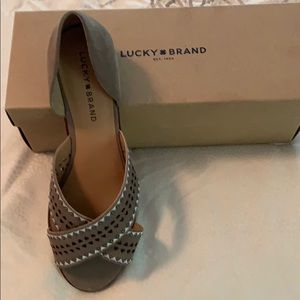 BRAND NEW SANDALS W/WHITE TRIM/METAL BEADS